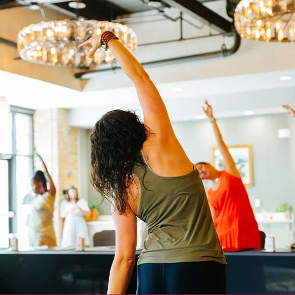 Women stretching at a fitness class.