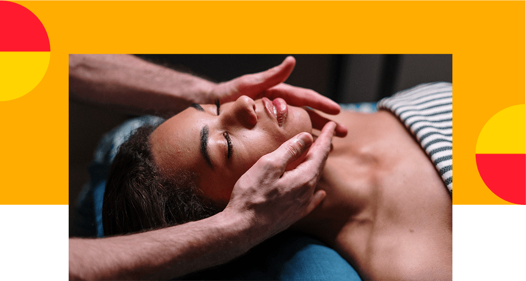 Woman receiving a neck massage.