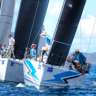 Two sailboats racing.