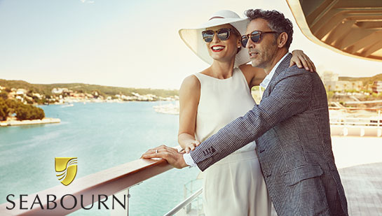 Couple on the deck of a Seabourn luxury ship