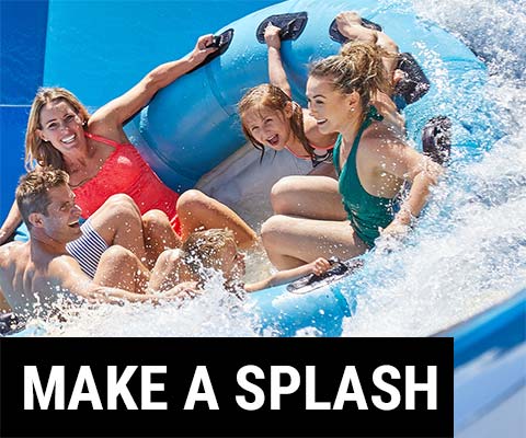 Make a splash - a family enjoying a water slide.