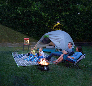 Family relaxing at campground