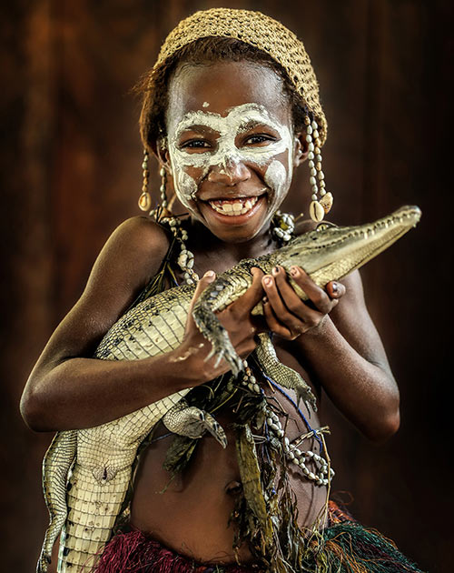 Sepik Papuan girl. Ambunti, East Sepik river, Papua New Guinea. Courtesy of www.un.org/en/exhibits/exhibit/world-in-faces