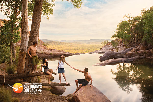 Two couples enjoying a scenic river in Australia's Outback.