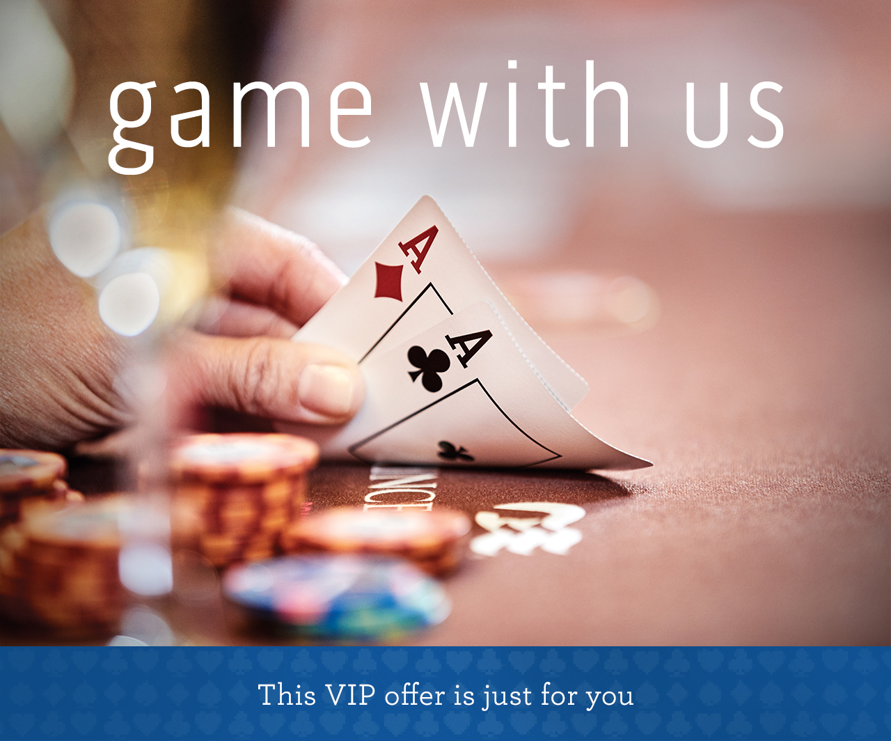 Close-up image of a glass of champagne, casino chips, and a hand revealing two ace cards | game with us - This VIP offer is just for you