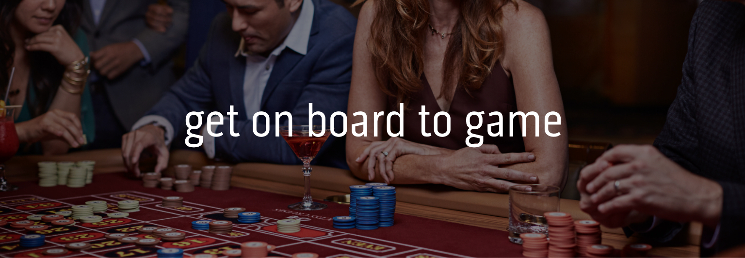 get on board to game. image of guests playing casino games