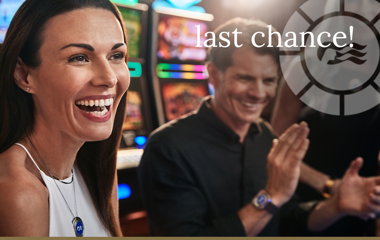 A man and woman laughing in the casino