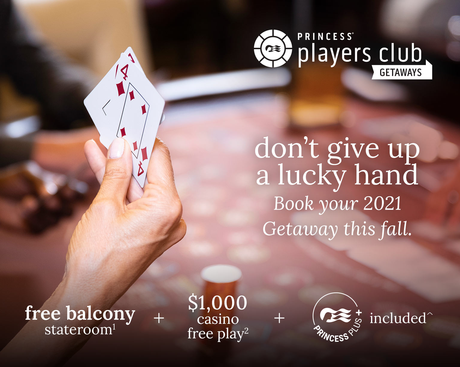 A man and a woman cheer at the slot machines - Princess Players Club Getaways - Don't give up a lucky hand, book your 2021 getaway! - free balcony stateroom + $1000 casino free play + princess plus+ included^