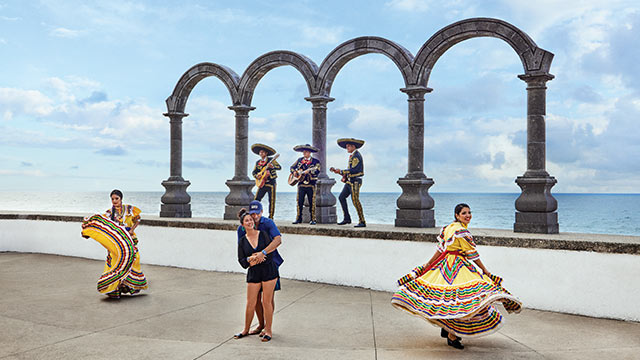 Dancing in front of the Puerto Vallarta arches. Click here to book.