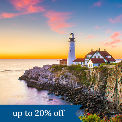 A lighthouse on a rocky New England coast. Click here to book.