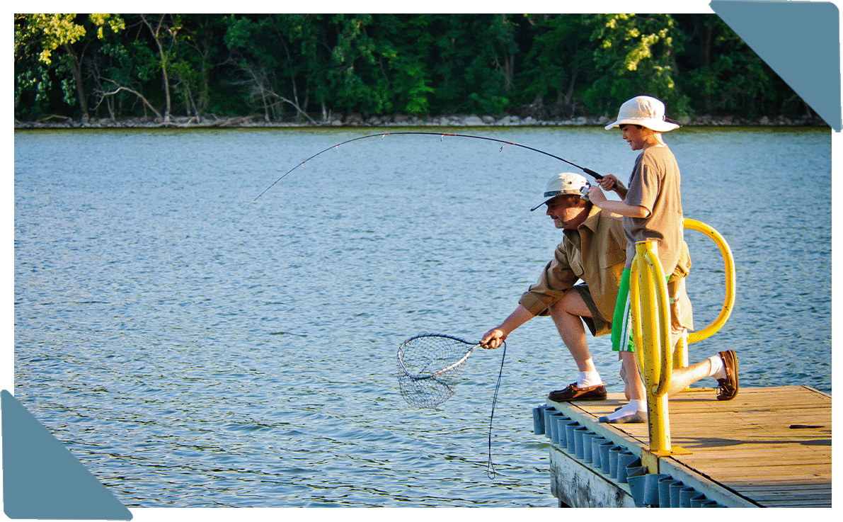 A father and son out fishing.