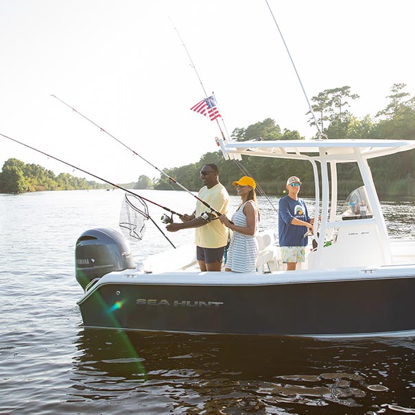 People out fishing on a boat. 