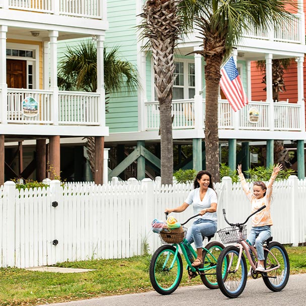 Mother and daughter riding bikes.