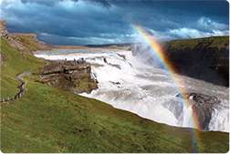 Rainbow over waterfall